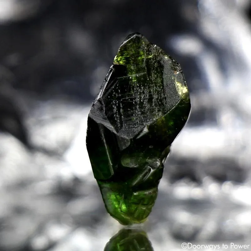 Green Tourmaline Crystal Skull Talisman by Leandro De Souza